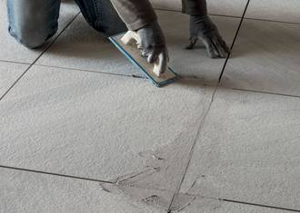 Grouting and cleaning after laying